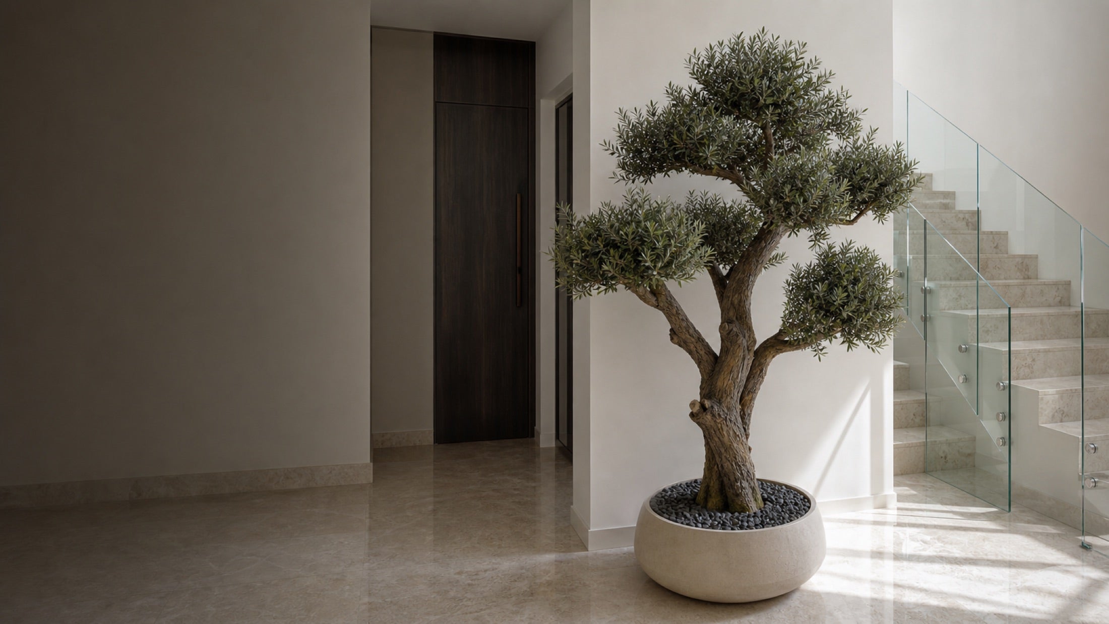 Custom artificial tree installation for a finished interior space